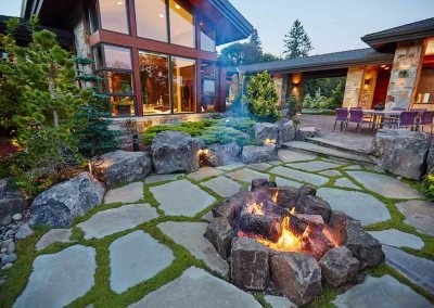 natural fire pit in residential landscape by Dennis' 7 Dees
