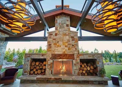 residential landscaping outdoor fireplace by Dennis' 7 Dees