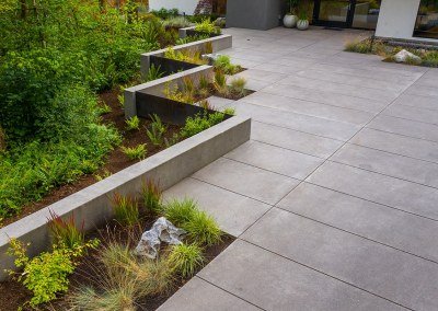 modern paver driveway with plants by Dennis' 7 Dees