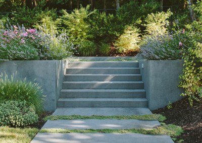 Paved concrete stairs and planters by Dennis' 7 Dees Landscaping