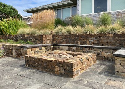 Hardscaped Patio with Built In Firepit and Seating by Dennis' 7 Dees Landscaping