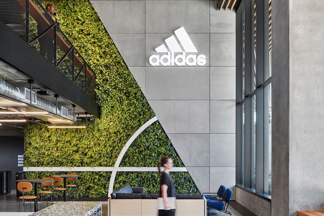 2-storey living wall with logo in Adidas headquarters, designed by 7 Dees Urban Plantscapes