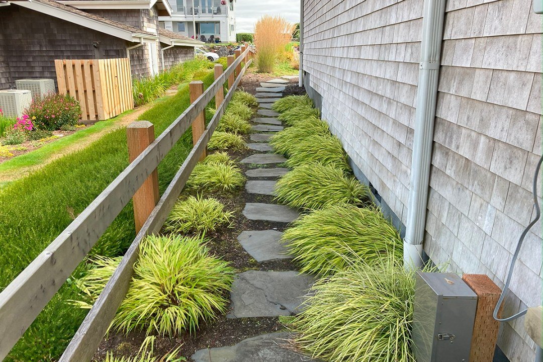 stone steps with ornamental grasses