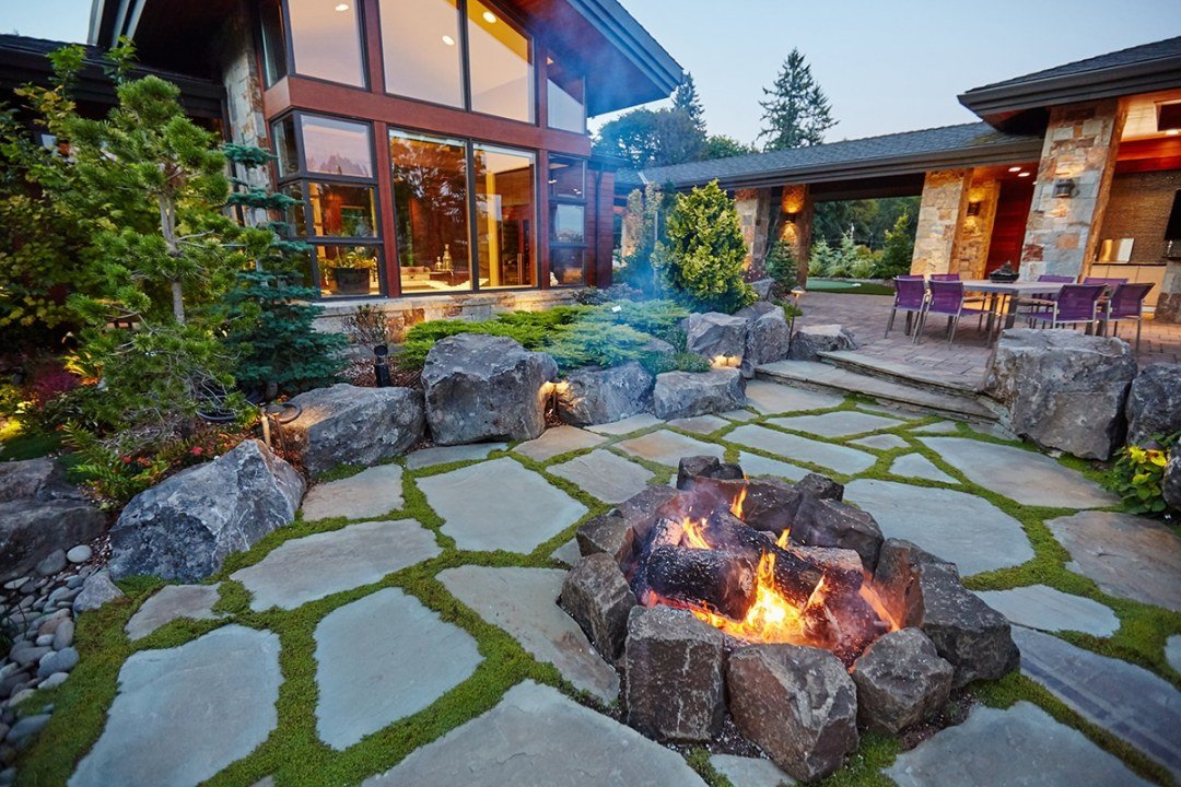 natural fire pit in residential landscape by Dennis' 7 Dees